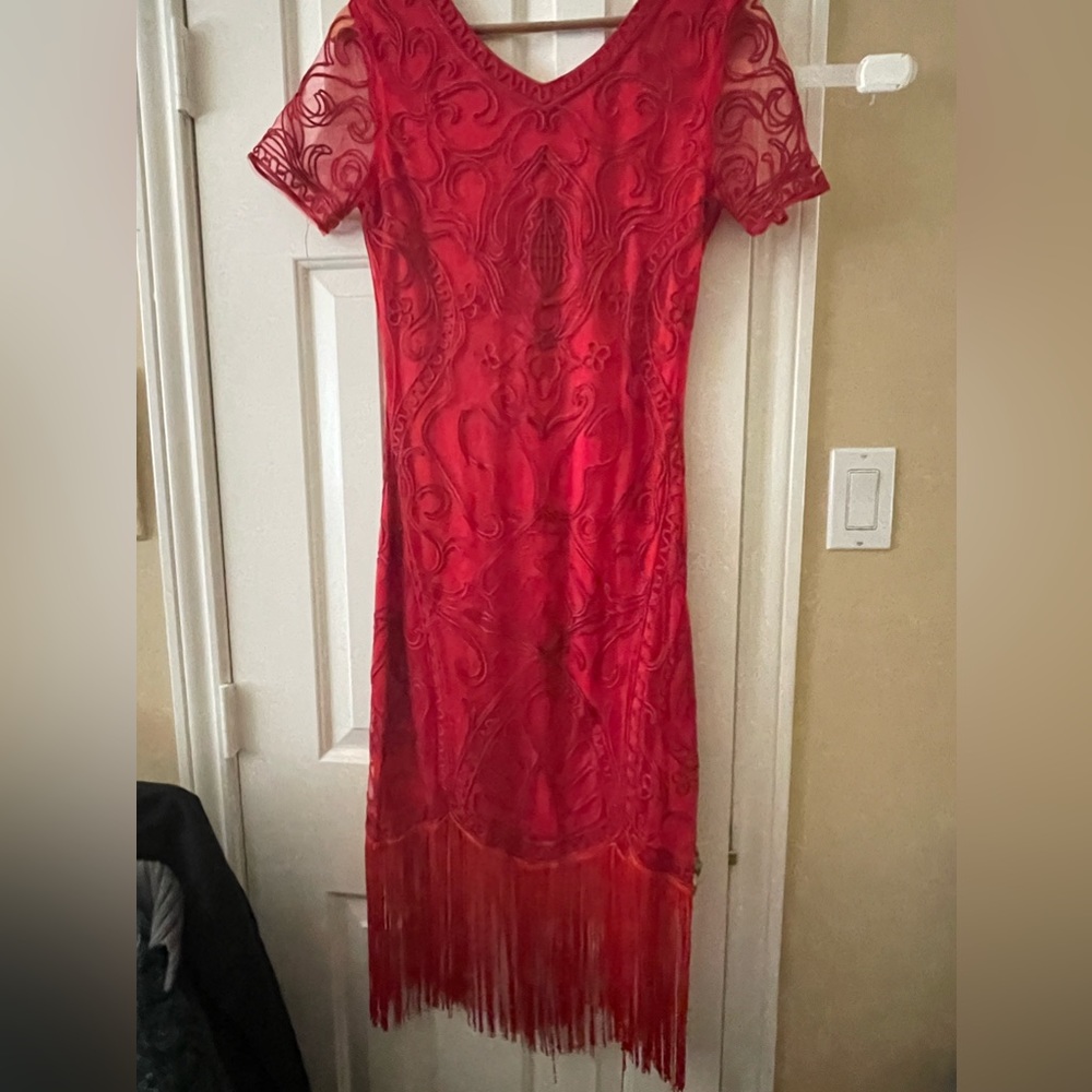 Red “flapper” dress with long fringed hem